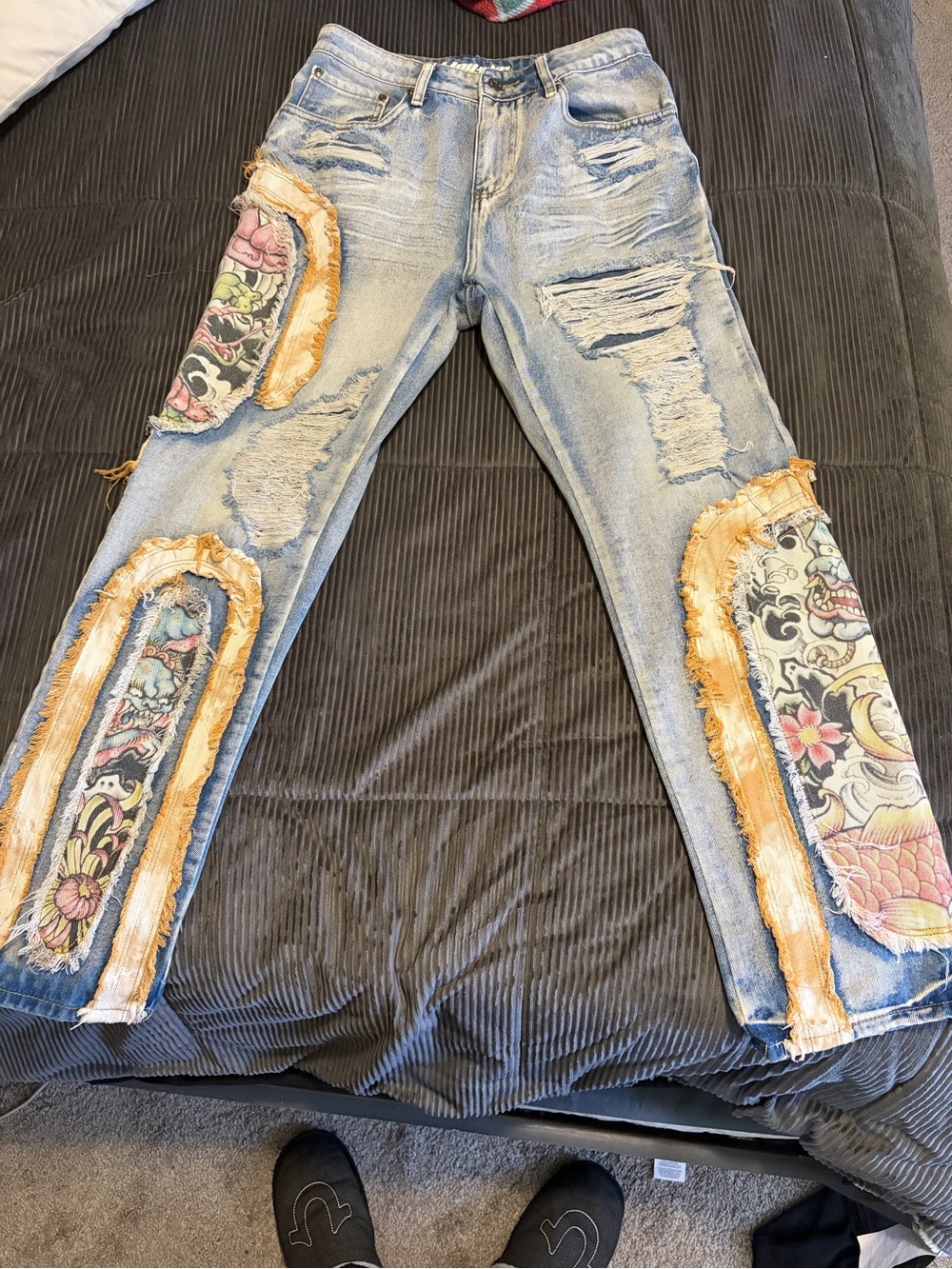 Light Wash Distressed Men’s Jeans with Floral Patch Details
